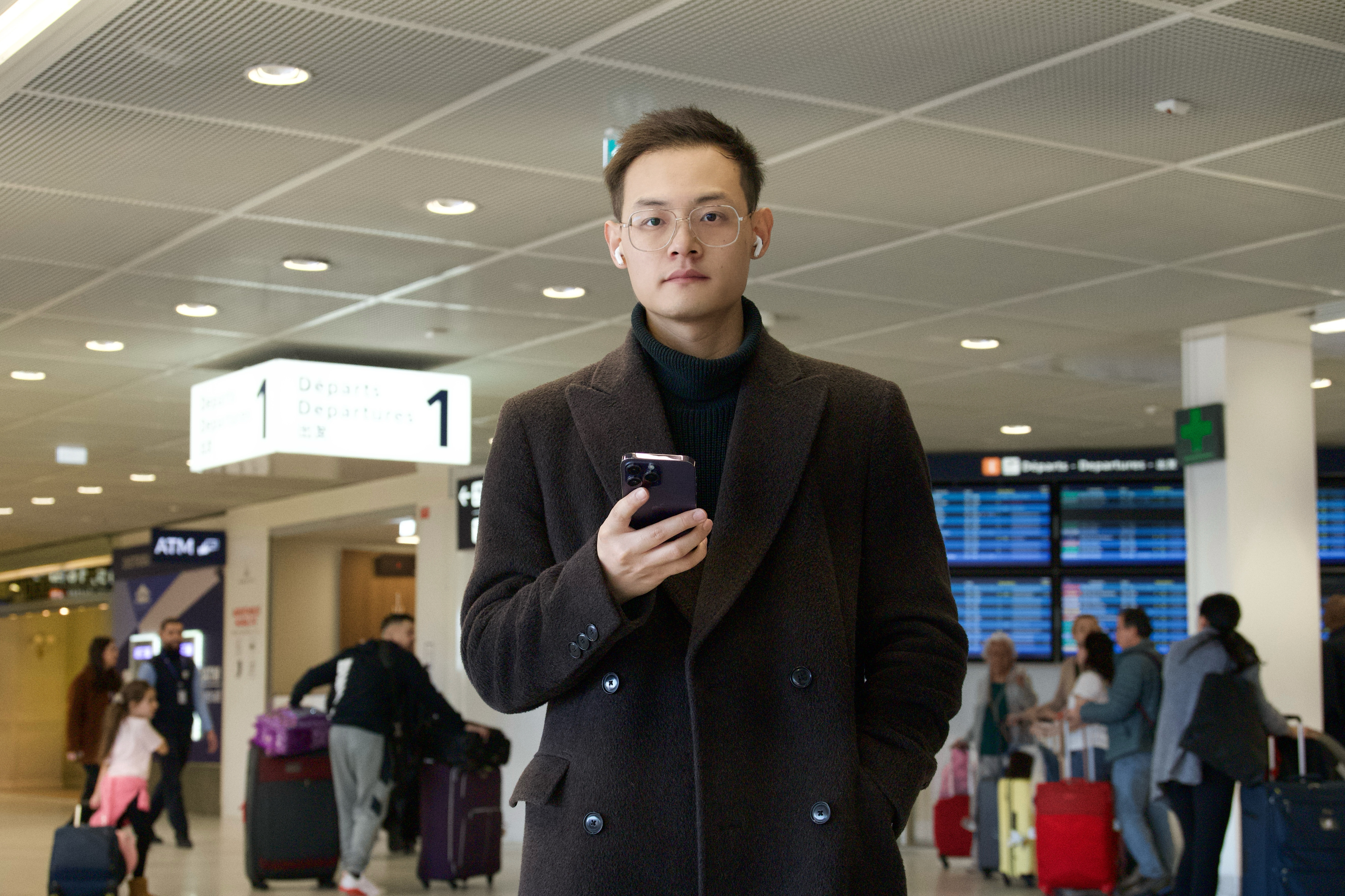 Xuekang Liu at an airport